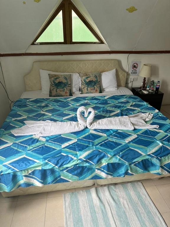 Prepared bed in the upstairs bedroom