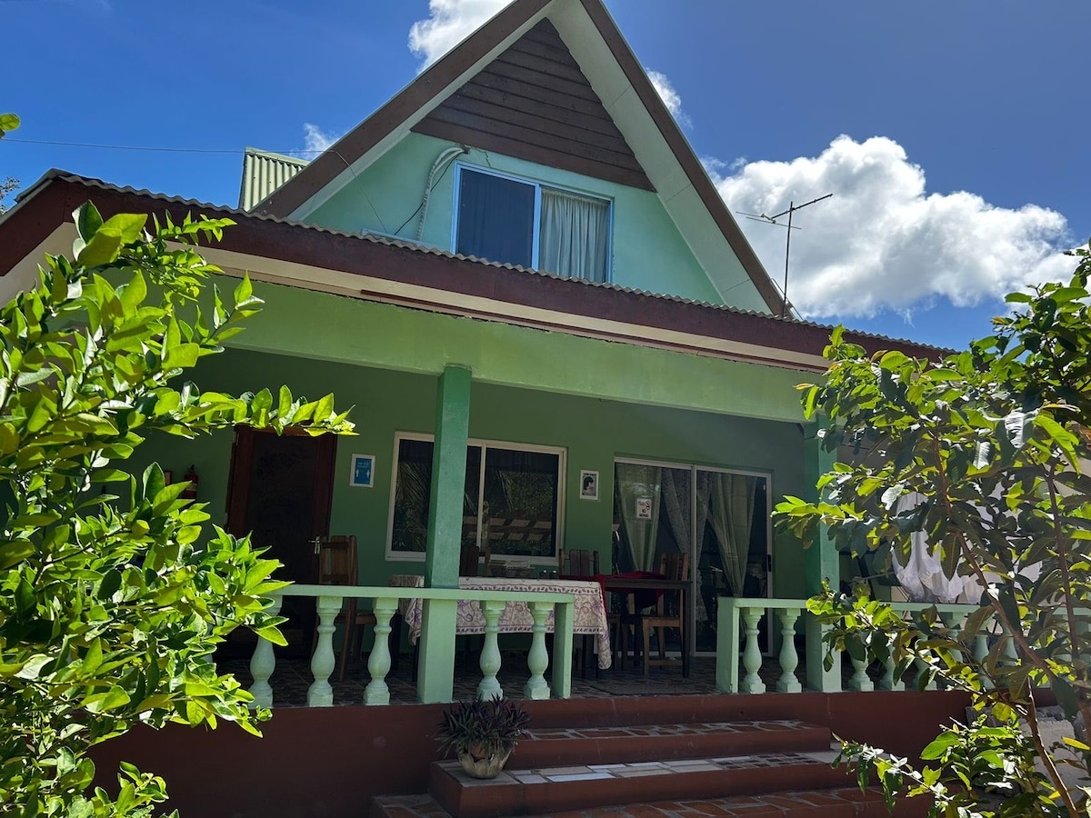 Exterior of Villa Coco d’Amour surrounded by tropical greenery